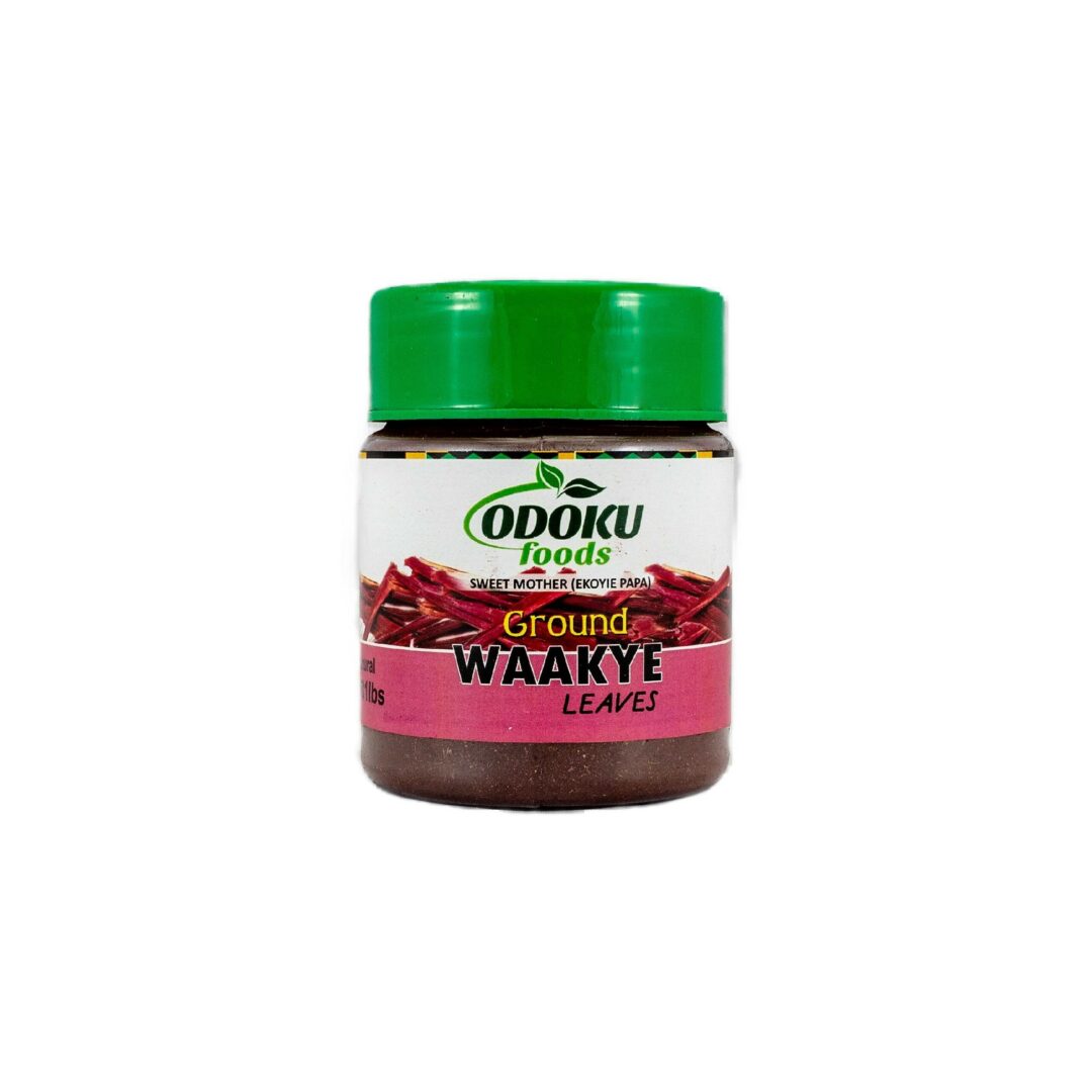 A jar of chili powder with a green lid.