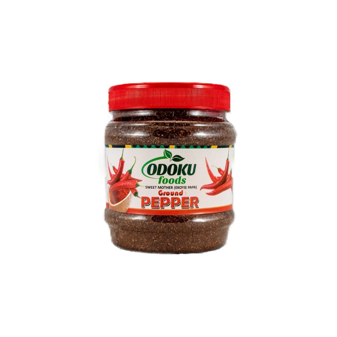 A jar of pepper seasoning on top of white background.