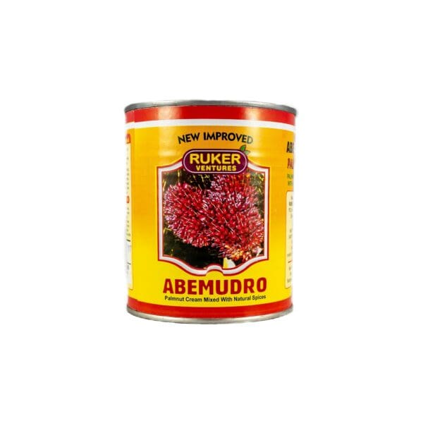 A can of red food on top of a white table.