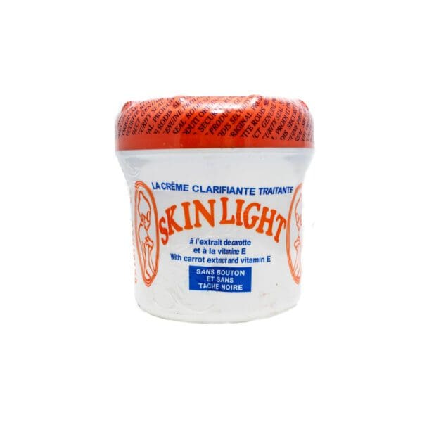 A container of skin light cream on a white background