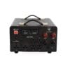 A black power supply with red buttons and wires.