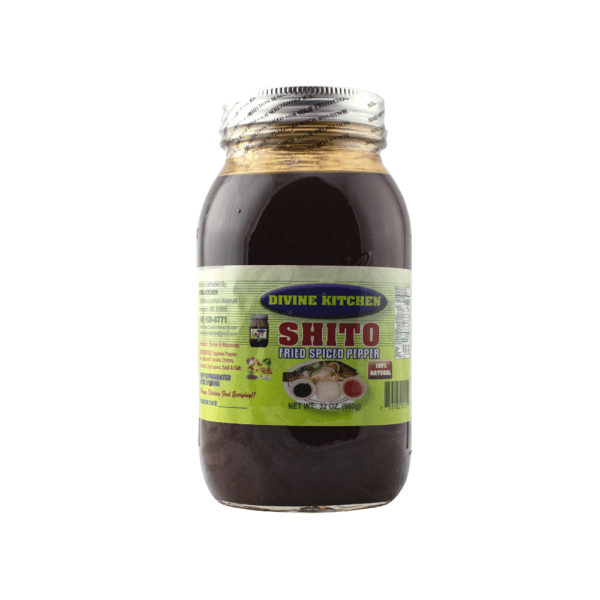 A jar of shito sauce with mushrooms on top.