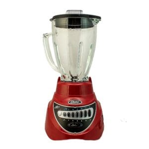 A red blender with a glass container on top of it.